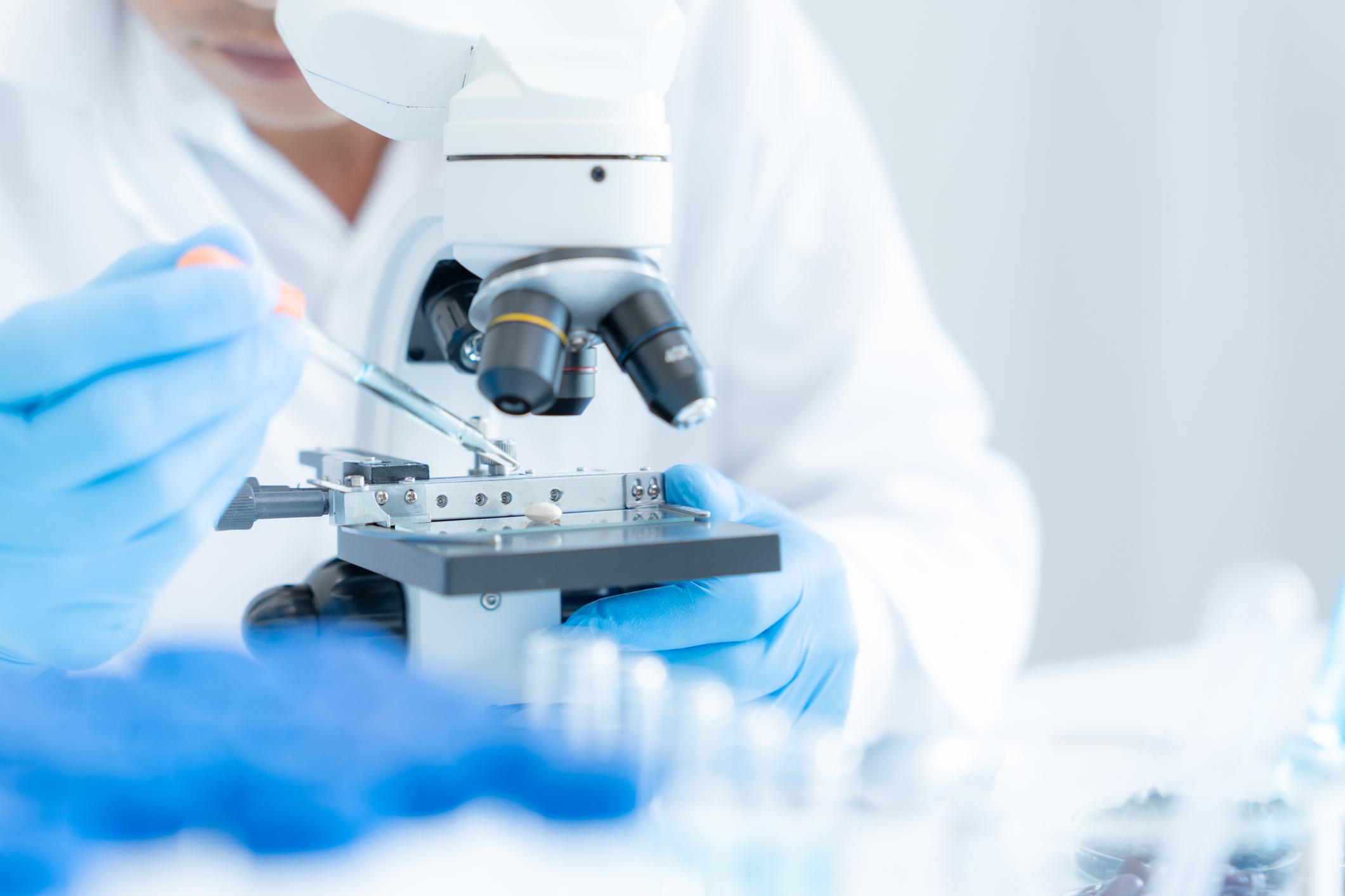 Scientist analyze biochemical samples in advanced scientific laboratory. Medical professional use microscope look microbiological developmental of viral. Biotechnology research in science lab. Scientist analyze biochemical samples in advanced scientific laboratory. Medical professional use microscope look microbiological developmental of viral. Biotechnology research in science lab.